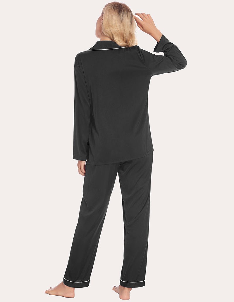 Back view of black satin pajama set; contrast-trim collar and straight-leg pants
