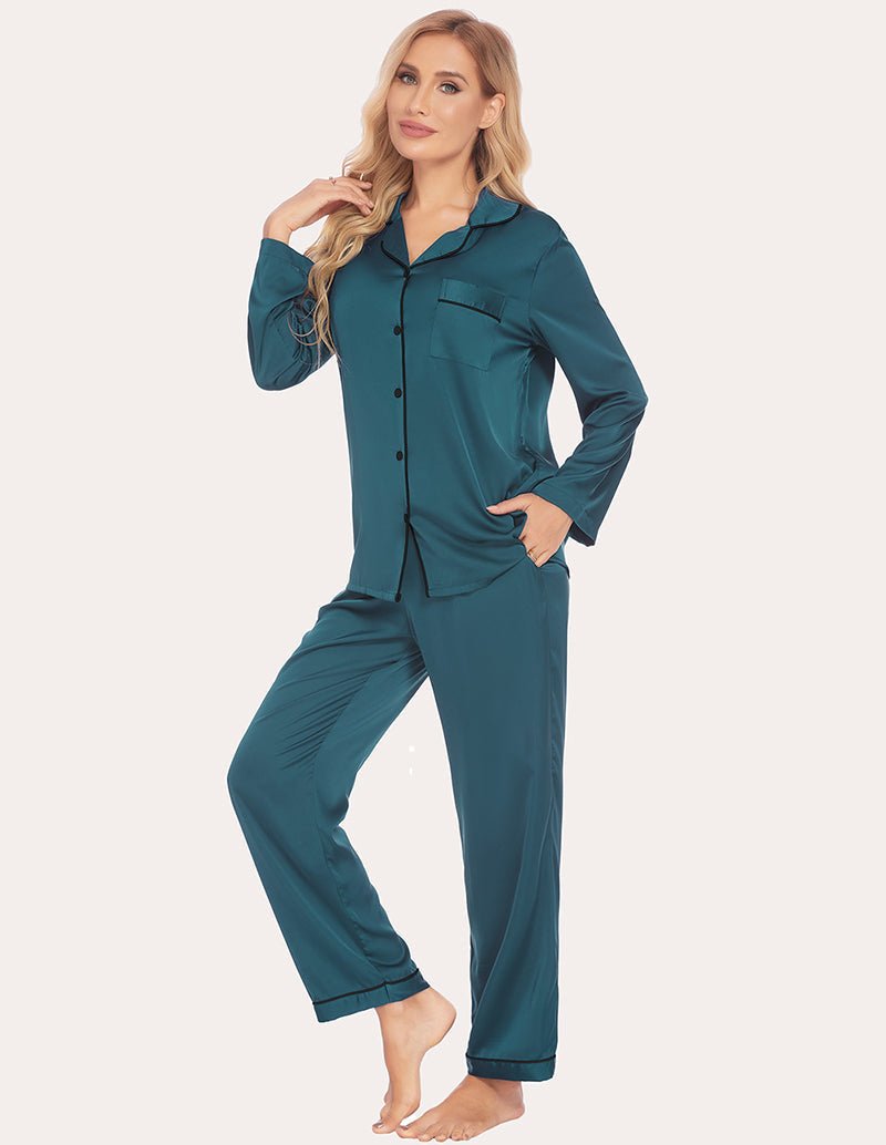 Dark green satin pajama set with contrast trim, long sleeves, and ankle-length pants