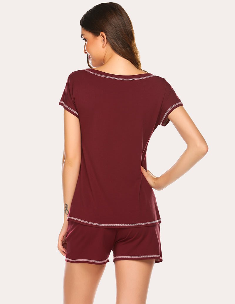 Wine-red pajama top with contrast neckline and short sleeves, paired with matching shorts