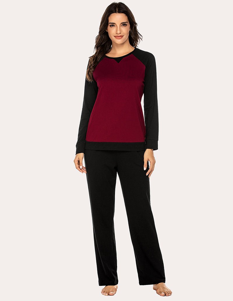 Women’s cotton pajama set with long-sleeve V-neck top and black straight-leg pants