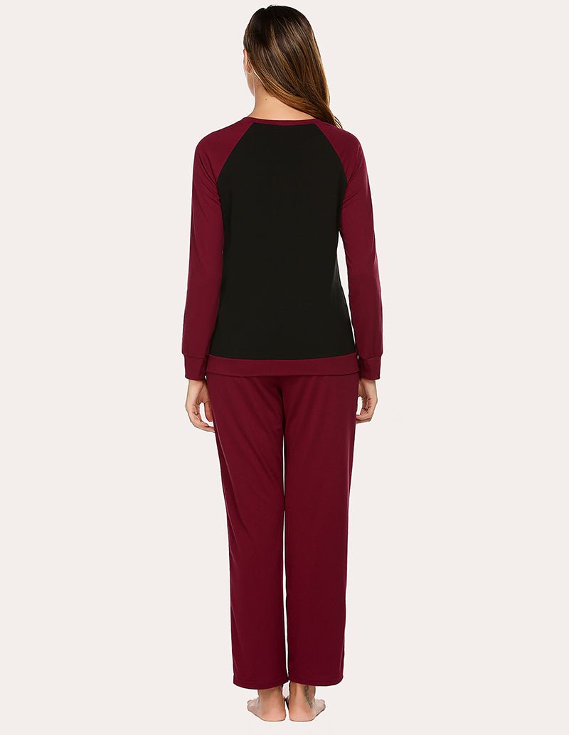 Cotton pajama set, back view: long-sleeve raglan top with matching drawstring pants in wine red.