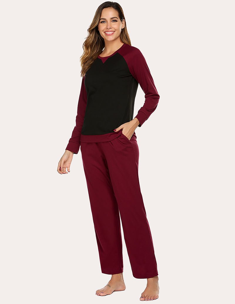 Cotton pajama set with long-sleeve top and matching pants, wine red sleeves and dark front panel.