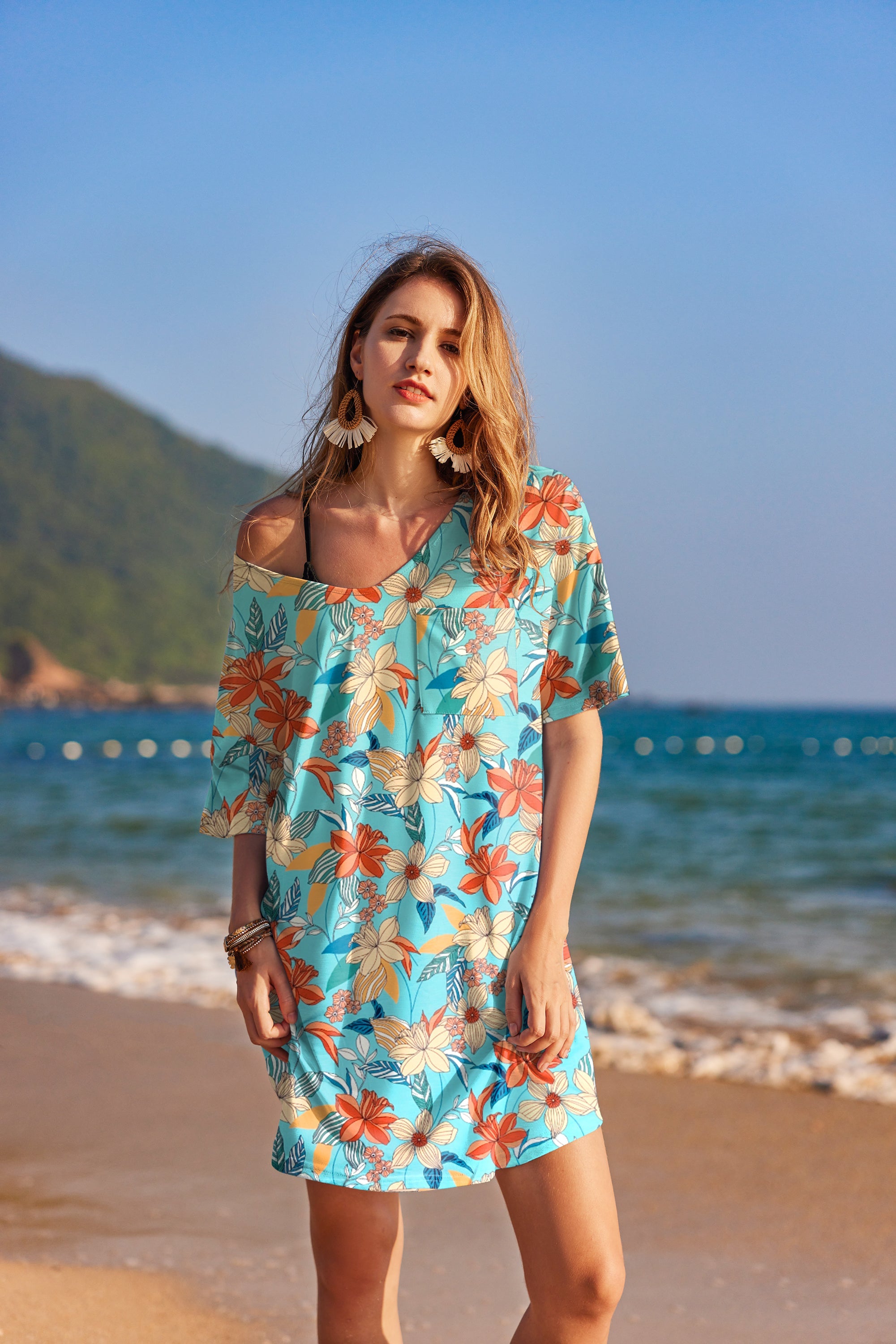 Cotton V-neck nightgown with short sleeves, teal floral pattern.