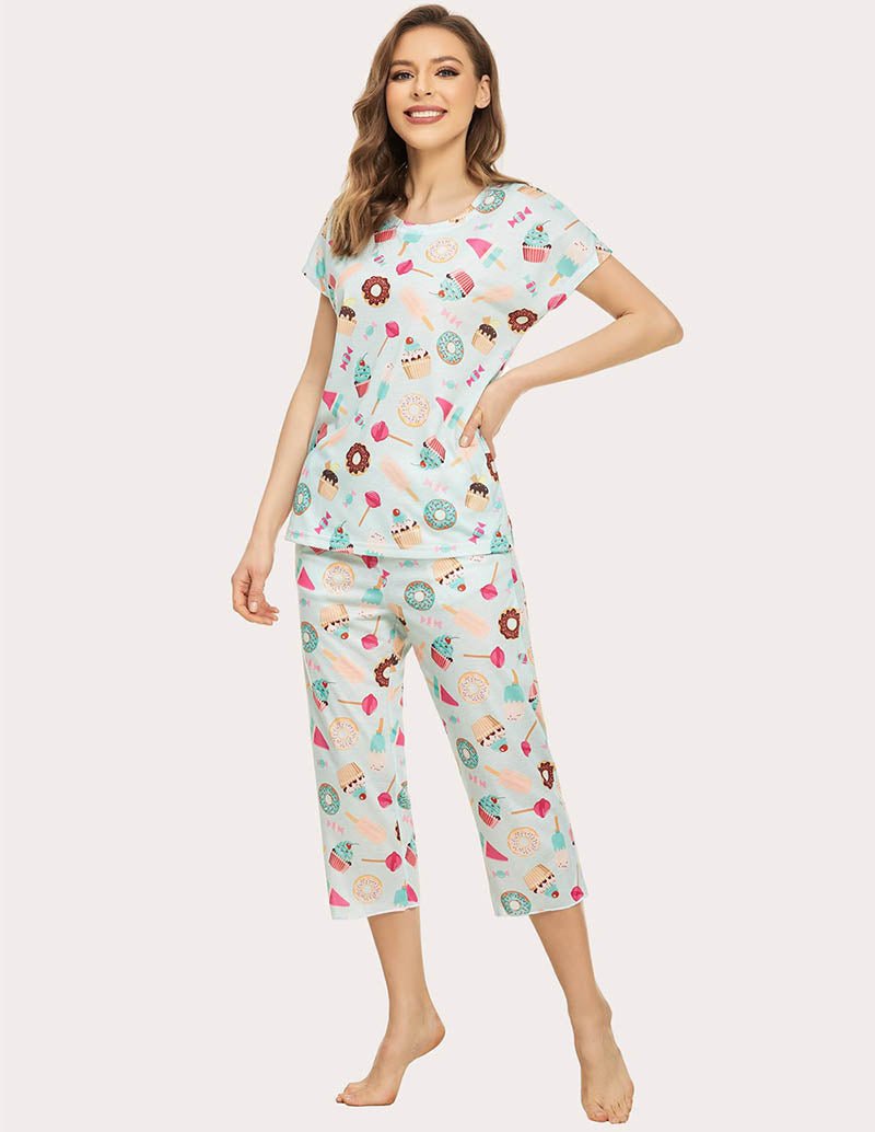 Women’s cropped pajama set in white with colorful food print, short sleeves and capris