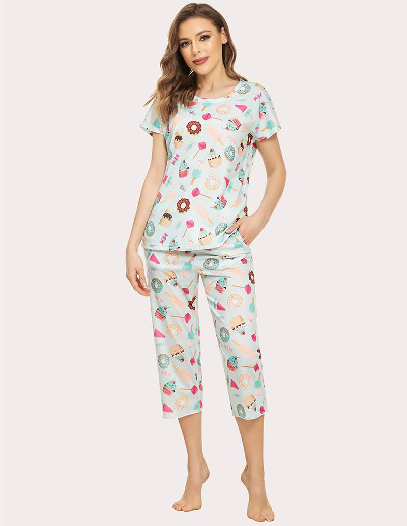 Women’s cropped pajama set in white with colorful food print, short-sleeve top and capri pants