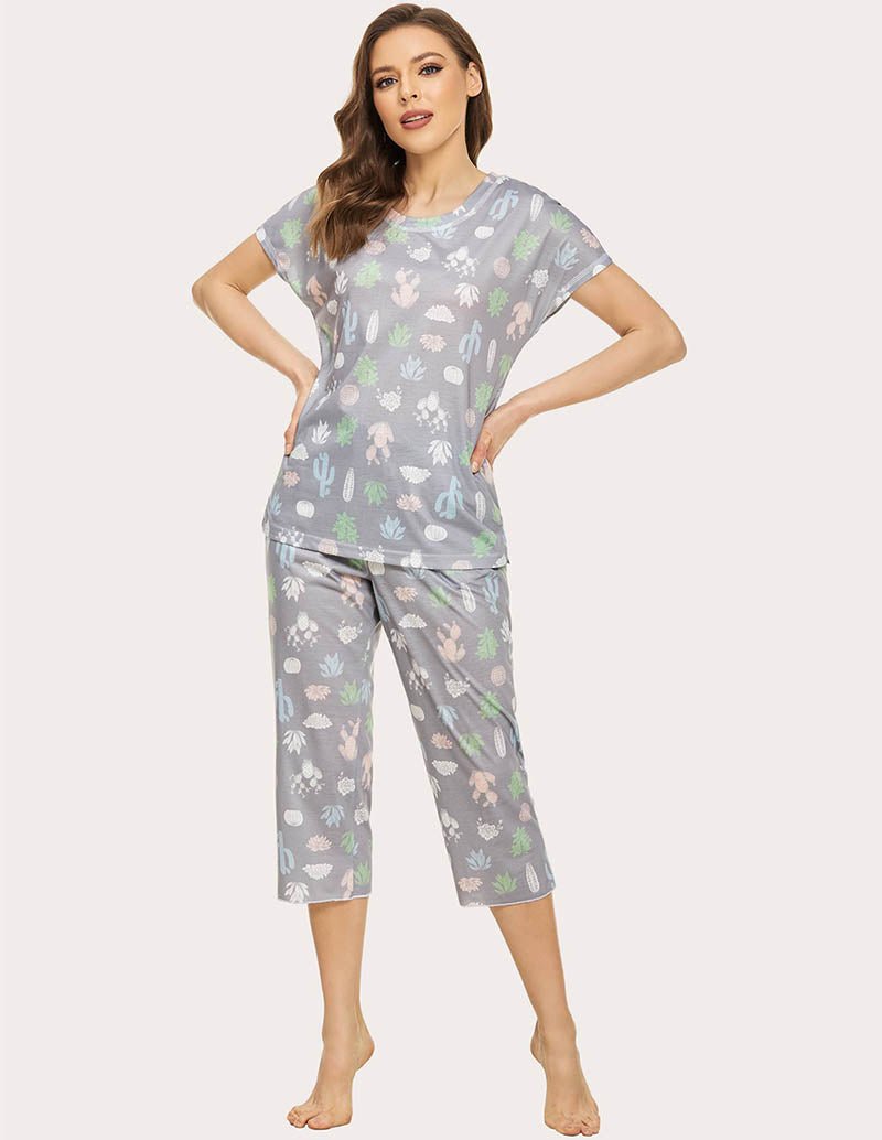 Cropped pajama set in grey with multicolor animal print; front view with short-sleeve top and capris.