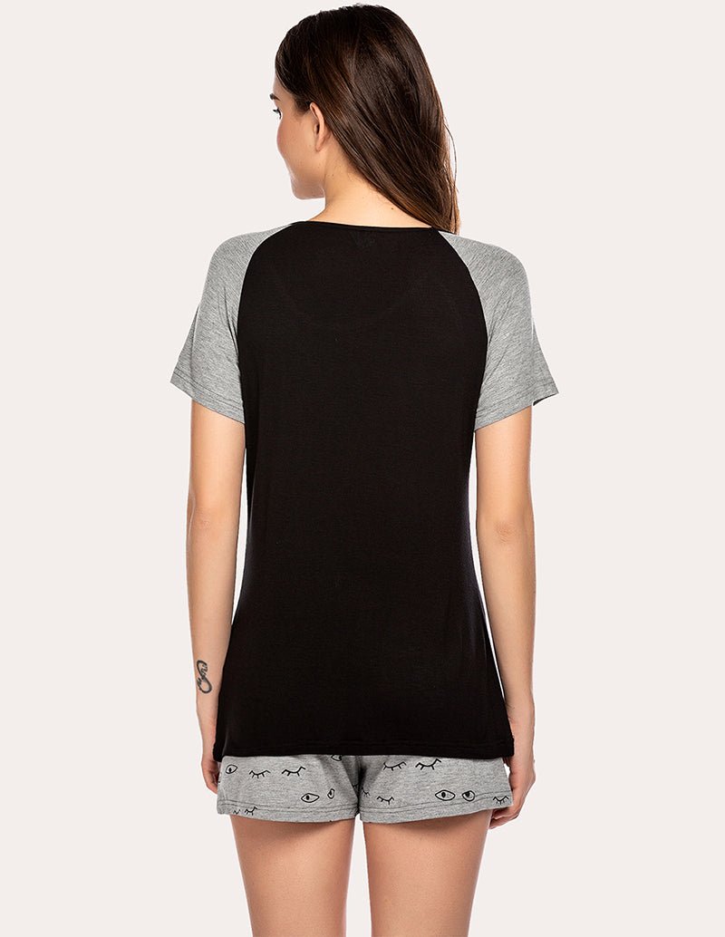 Women's black pajama set back view with gray patterned shorts