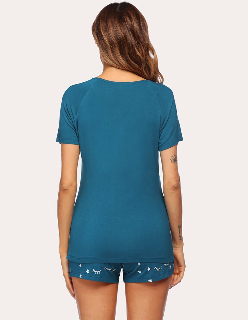 Women's peacock blue pajama set back view with patterned shorts