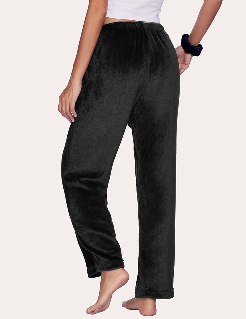 Black flannel pajama pants with relaxed straight-leg fit and ankle cuffs