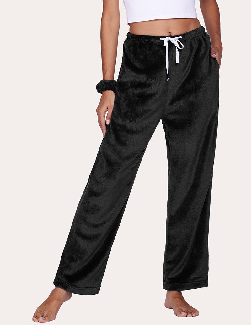 Black flannel pajama pants with drawstring elastic waist and cuffed ankles