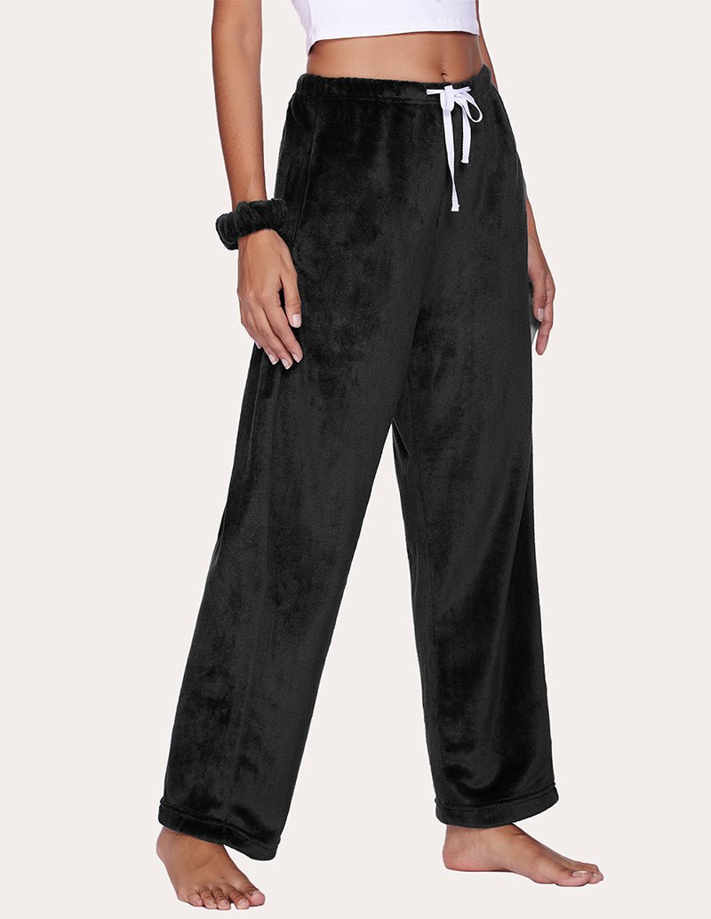Black flannel lounge pants with white drawstring and elastic waistband