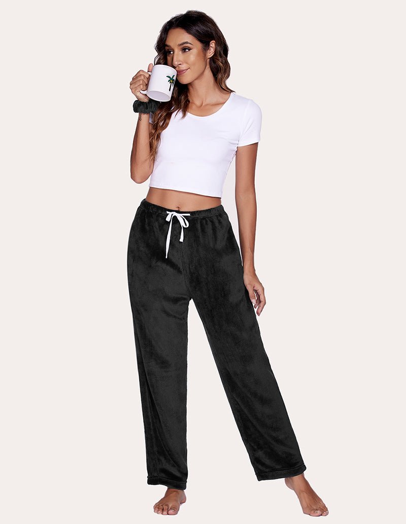 Black flannel pajama pants, full length with drawstring waist and roomy legs
