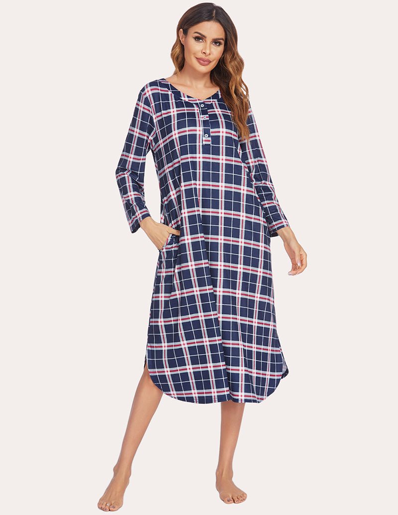 Navy plaid flannel nightgown with button-front, long sleeves, and curved hem