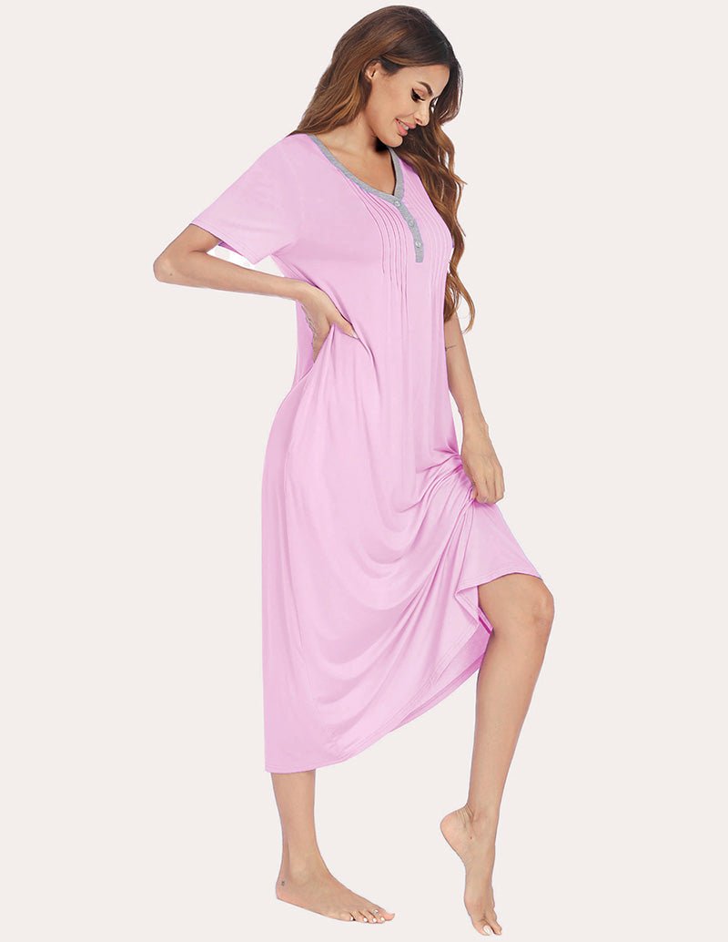 Henley sleep dress in misty rose, angled front view with side pockets and button placket
