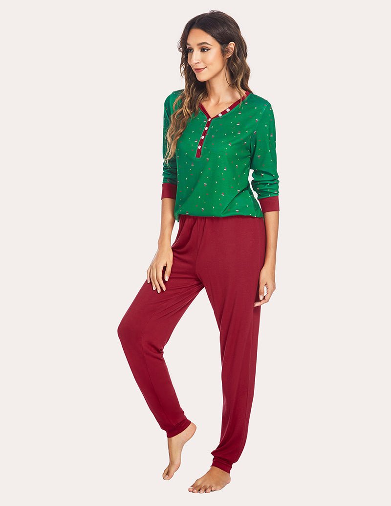 Green holiday pajama set front view: long-sleeve henley top and matching jogger pants