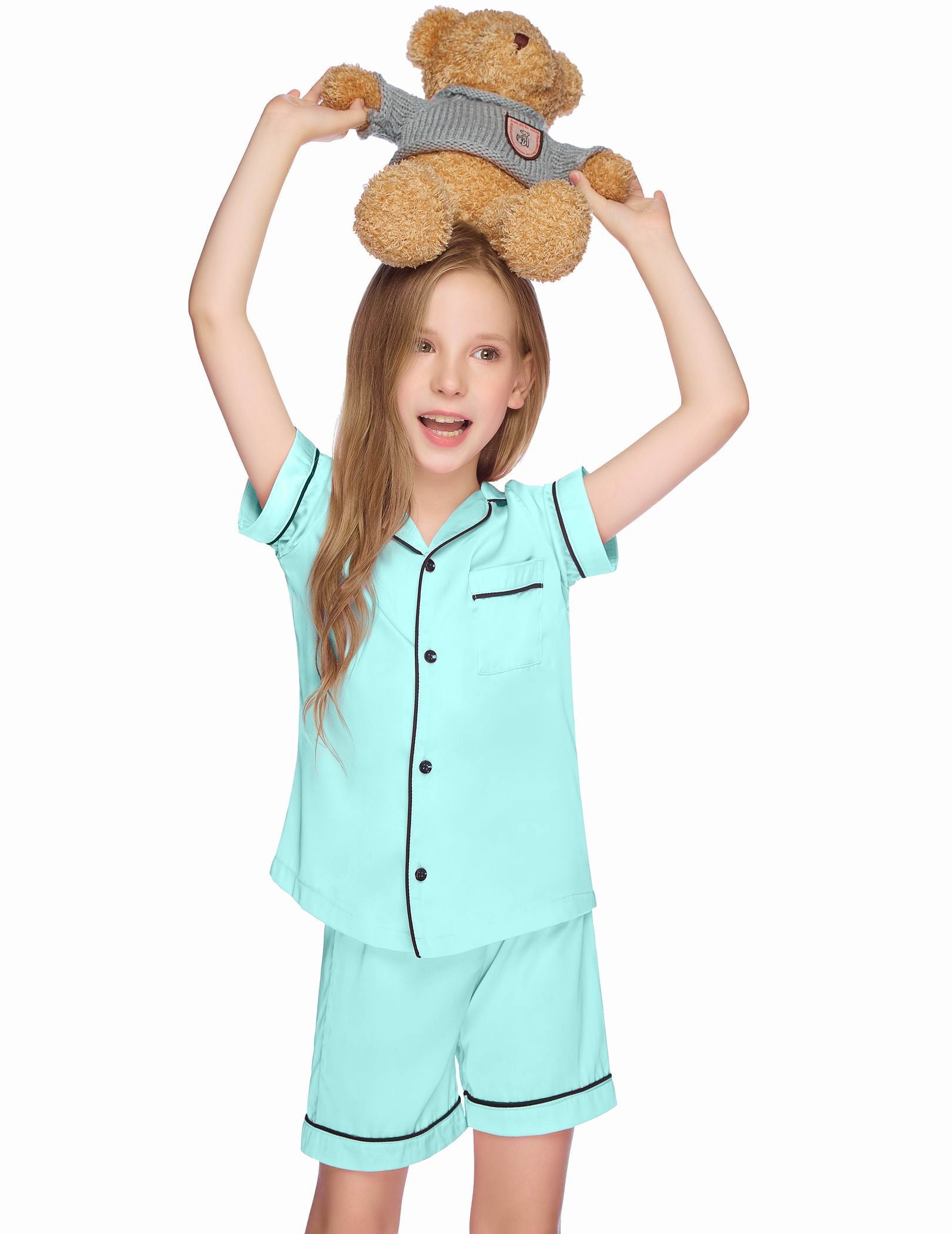 Kids satin pajama set in mint/green with short-sleeve button-up top and matching shorts.