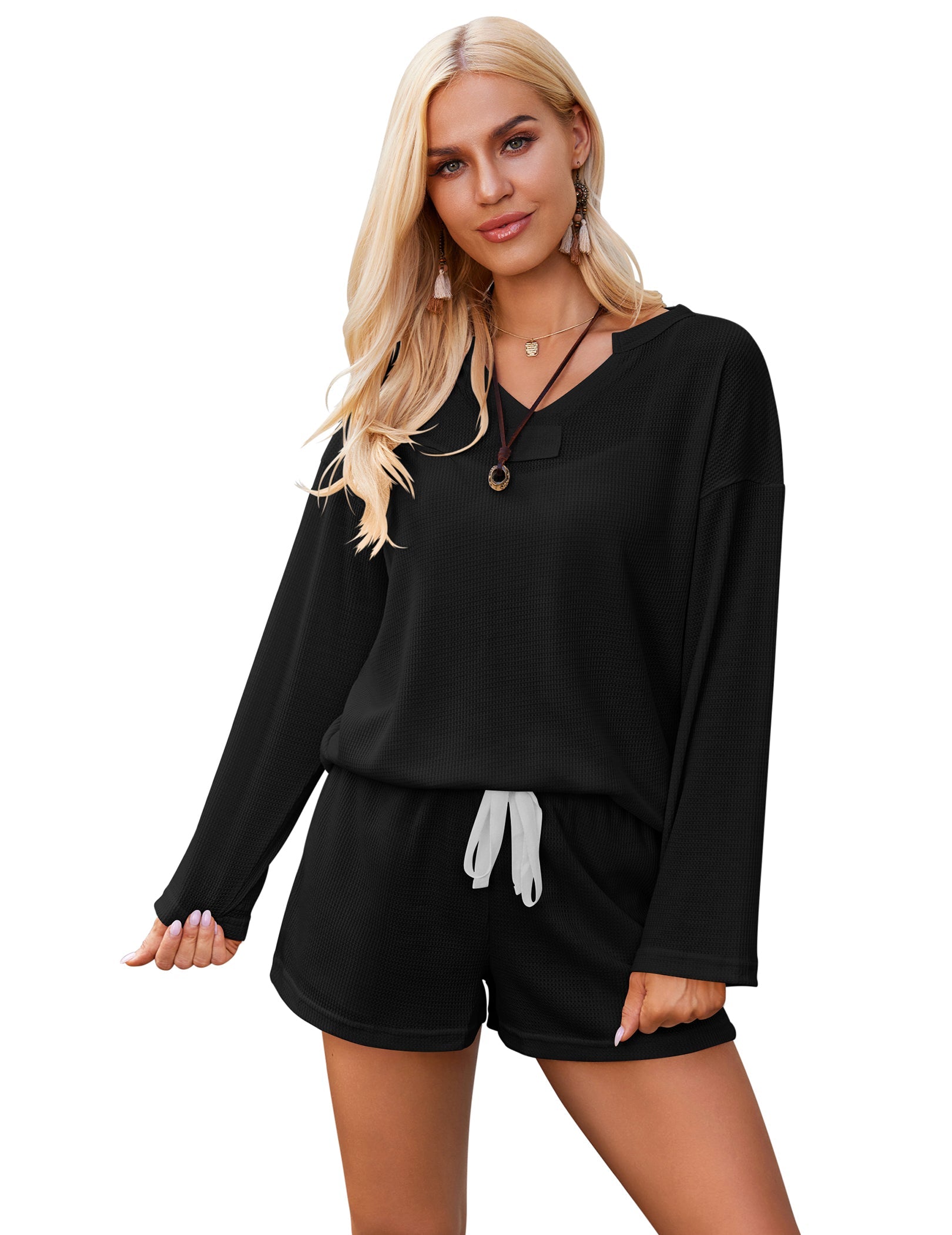 Black knit long-sleeve pajama set with hooded neckline and drawstring shorts