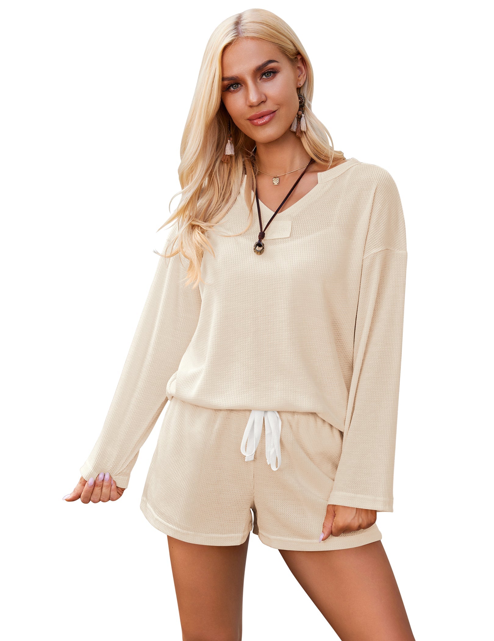 Cream knit long-sleeve pajama set with hooded neckline and drawstring shorts