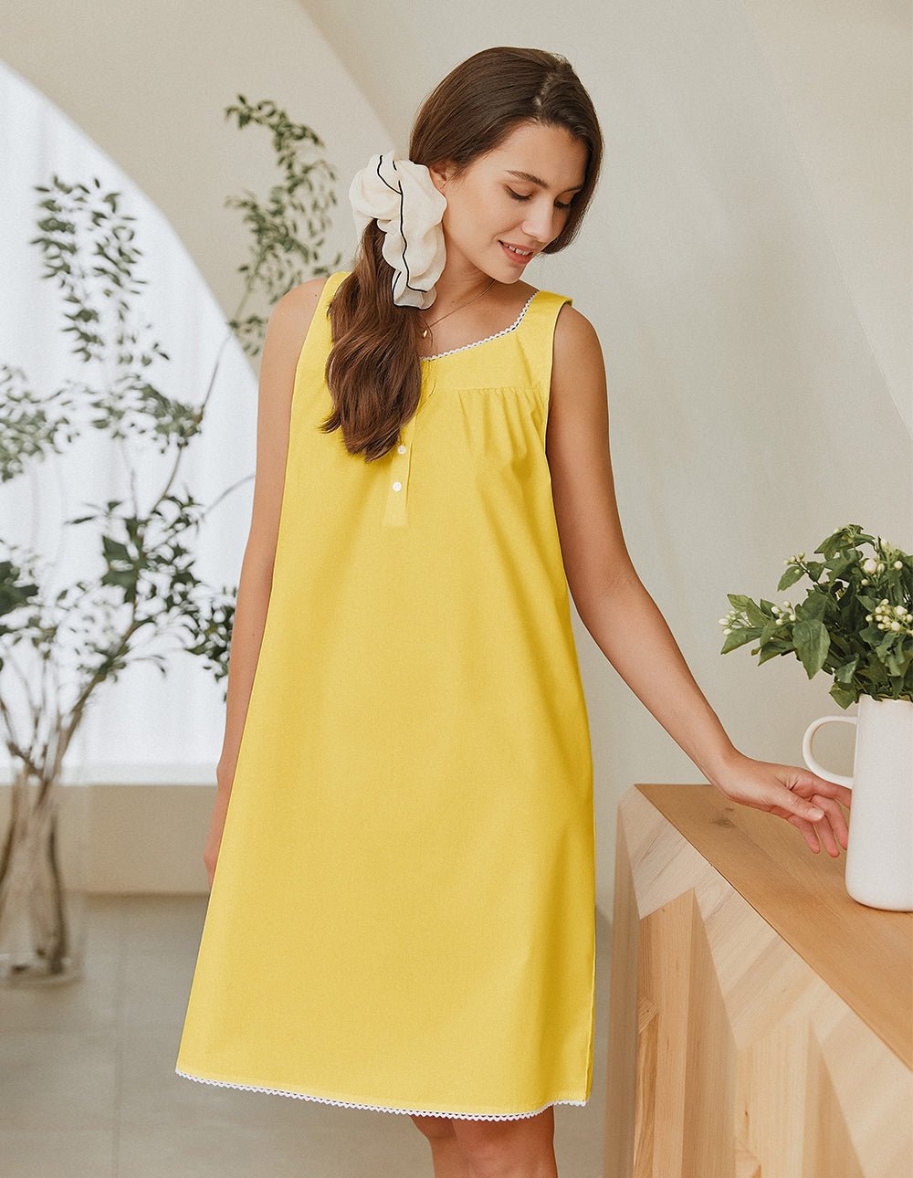 Teal lace-trim nightdress with sleeveless scoop neckline and subtle pleats