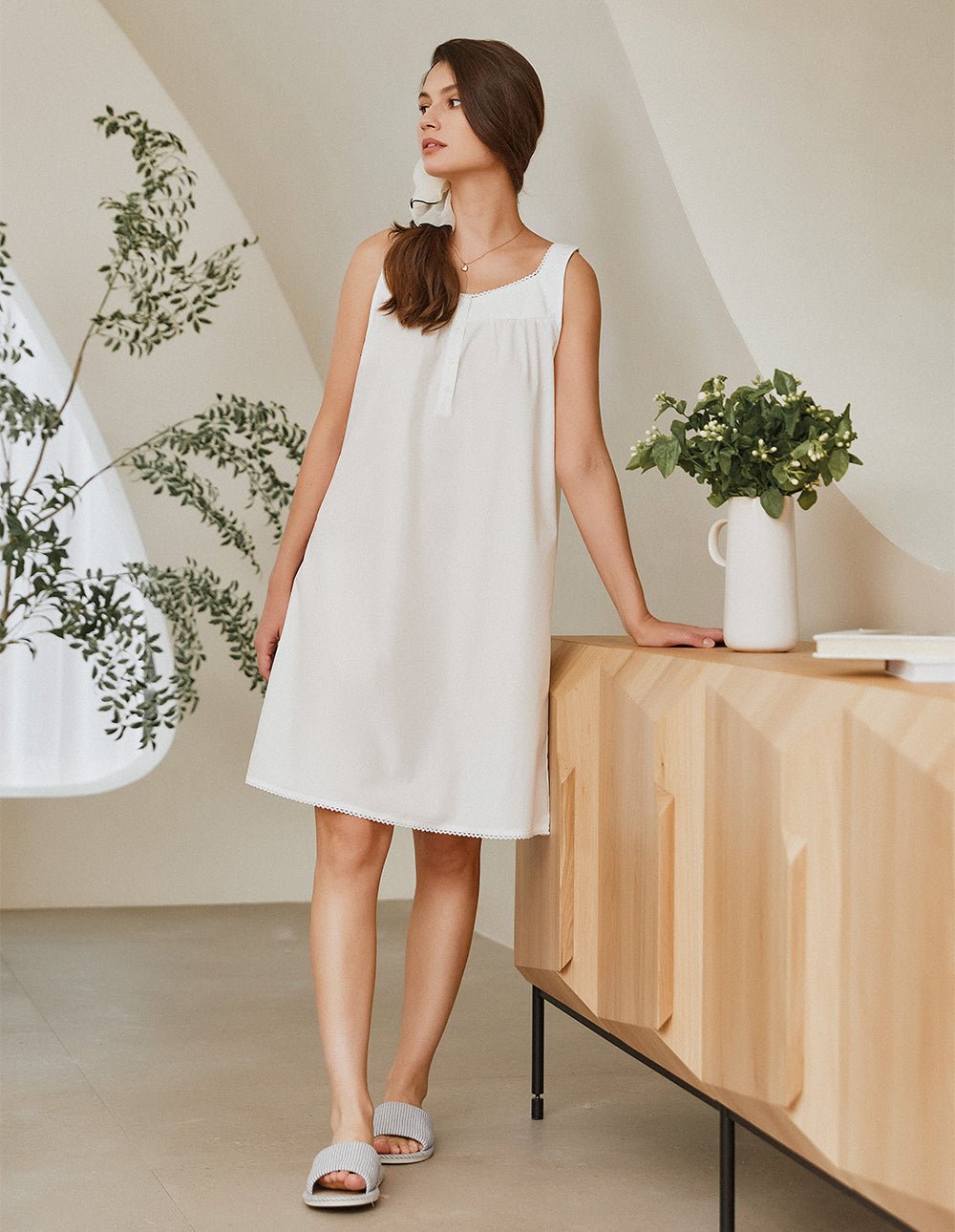 White lace-brim sleeveless nightdress with scoop neckline and button front
