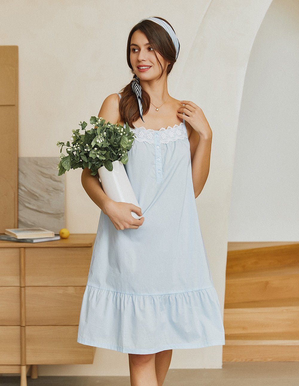 Light blue lace-trim nightdress with button placket and tiered skirt, thin straps