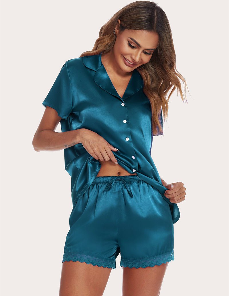 Teal satin pajama set with button-front blouse and lace-trim shorts, waist and draw detail