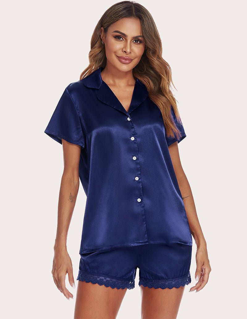 Navy satin pajama set with collared V-neck button-front blouse and lace-trim shorts