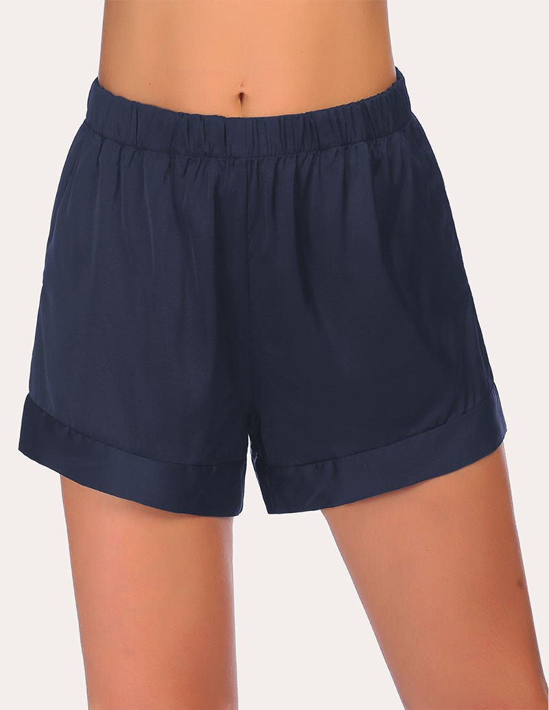 Navy loose pajama shorts with elastic waistband and relaxed straight-leg fit
