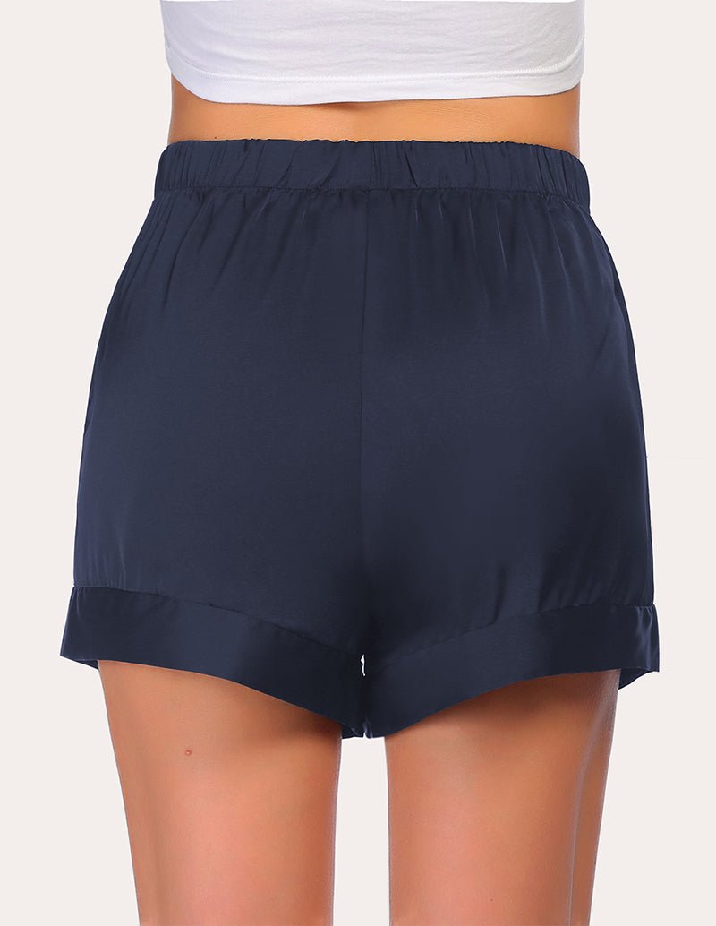 Navy loose pajama shorts with elastic waistband and small front opening