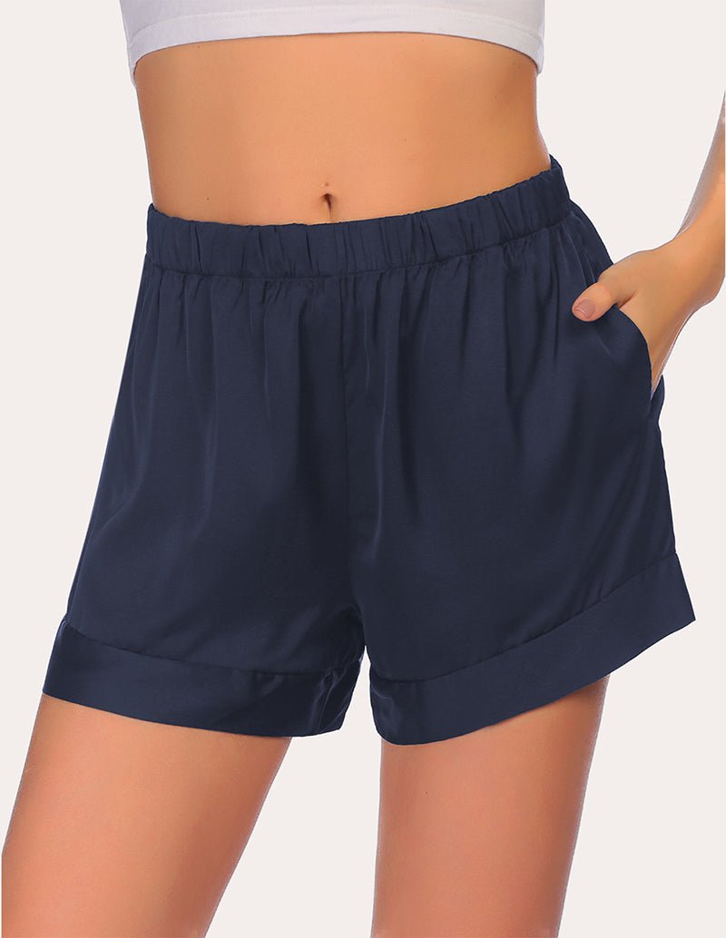 Navy loose pajama shorts with elastic waistband and side drape detail