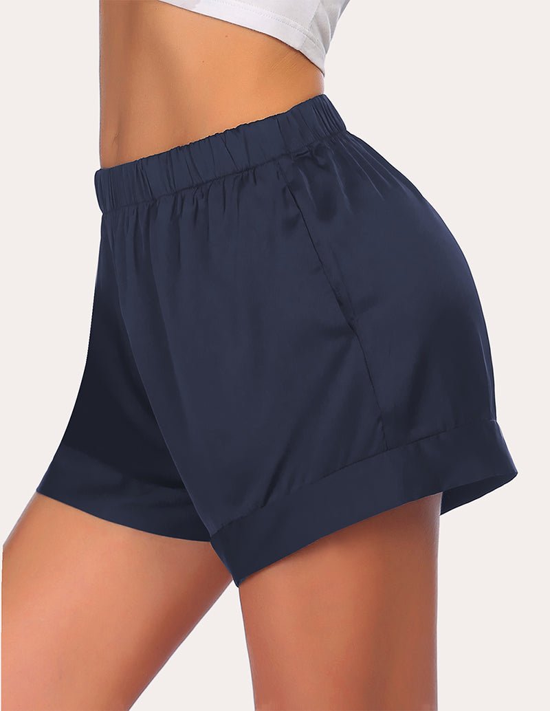 Navy loose pajama shorts with elastic waistband and slightly flared leg opening