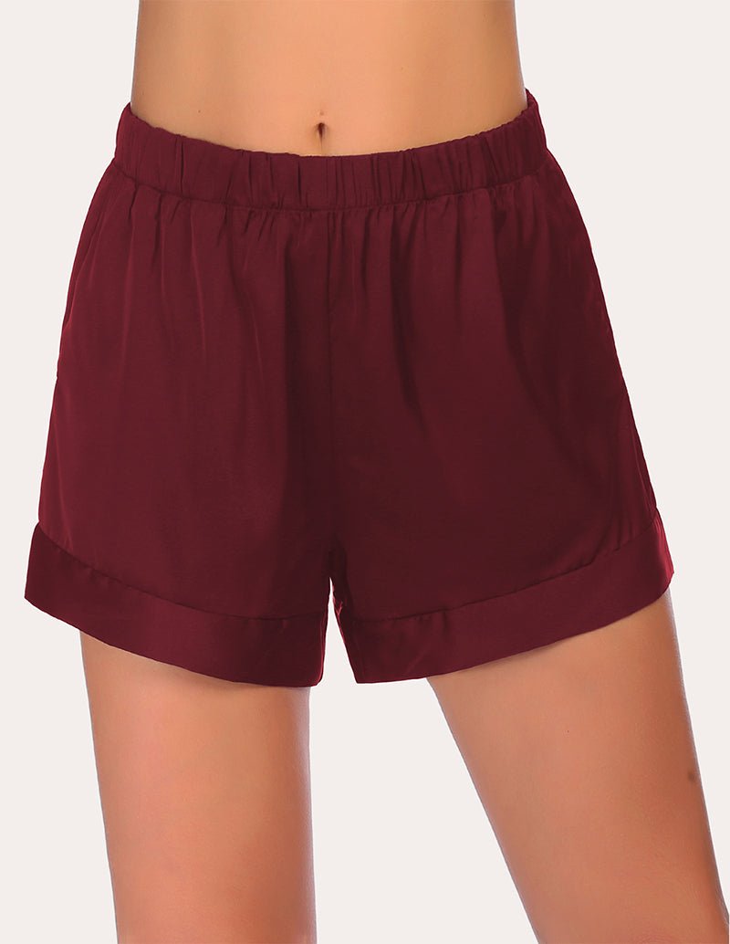 Wine red pajama shorts with elastic waist and relaxed straight-leg silhouette