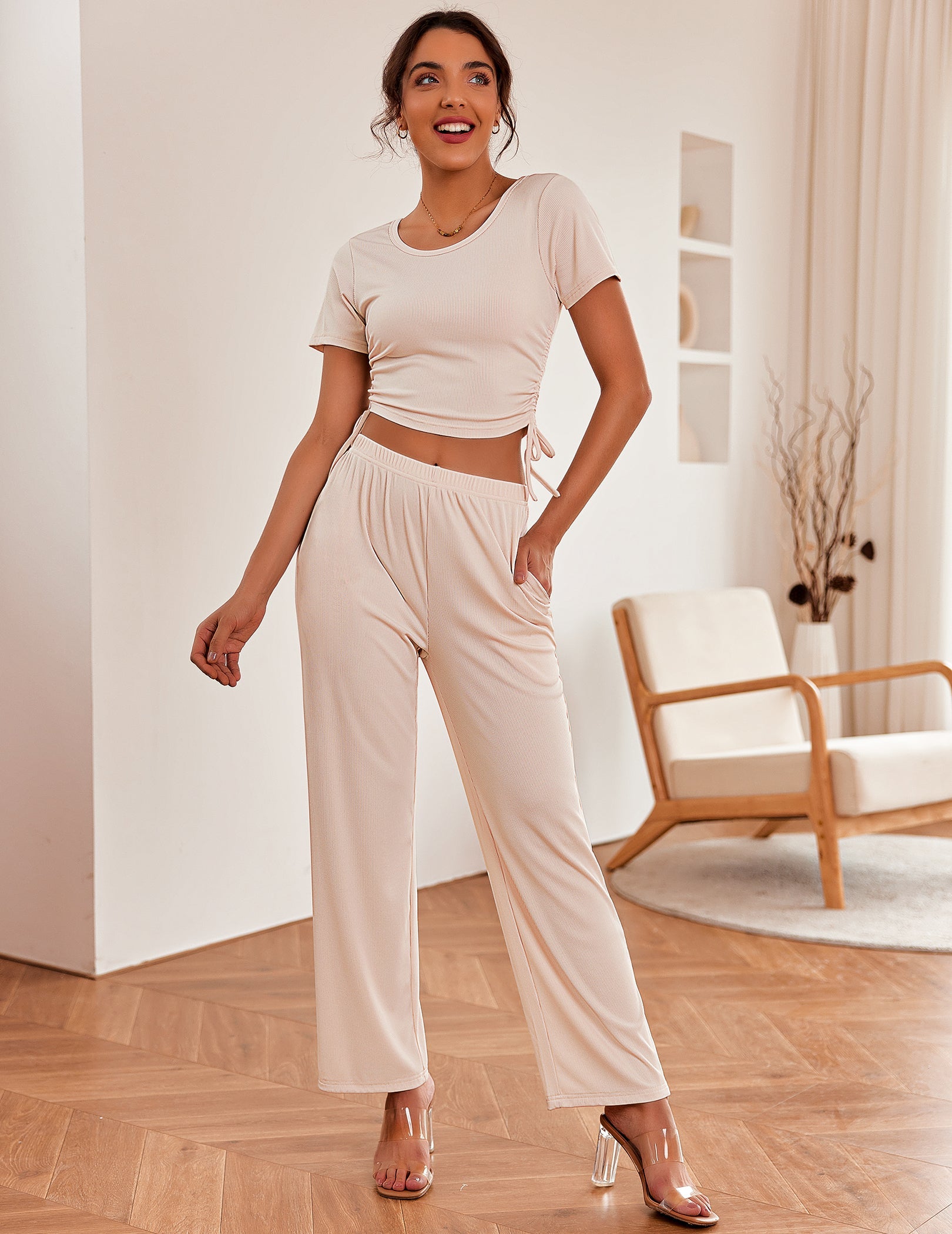 Two-piece lounge set in cream: short-sleeve cropped top and wide-leg drawstring pants