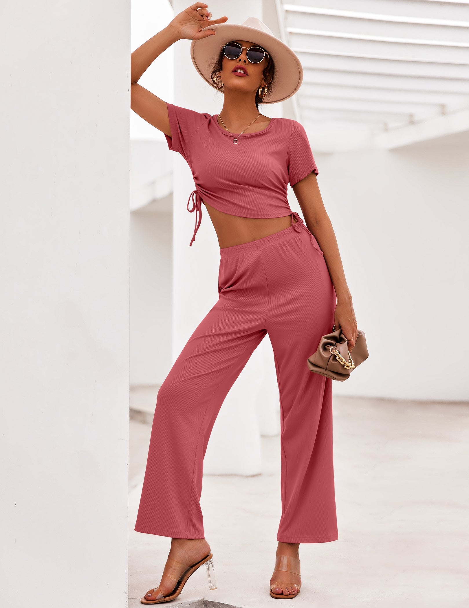 Two-piece lounge set in dusty rose: short-sleeve cropped top and drawstring wide-leg pants
