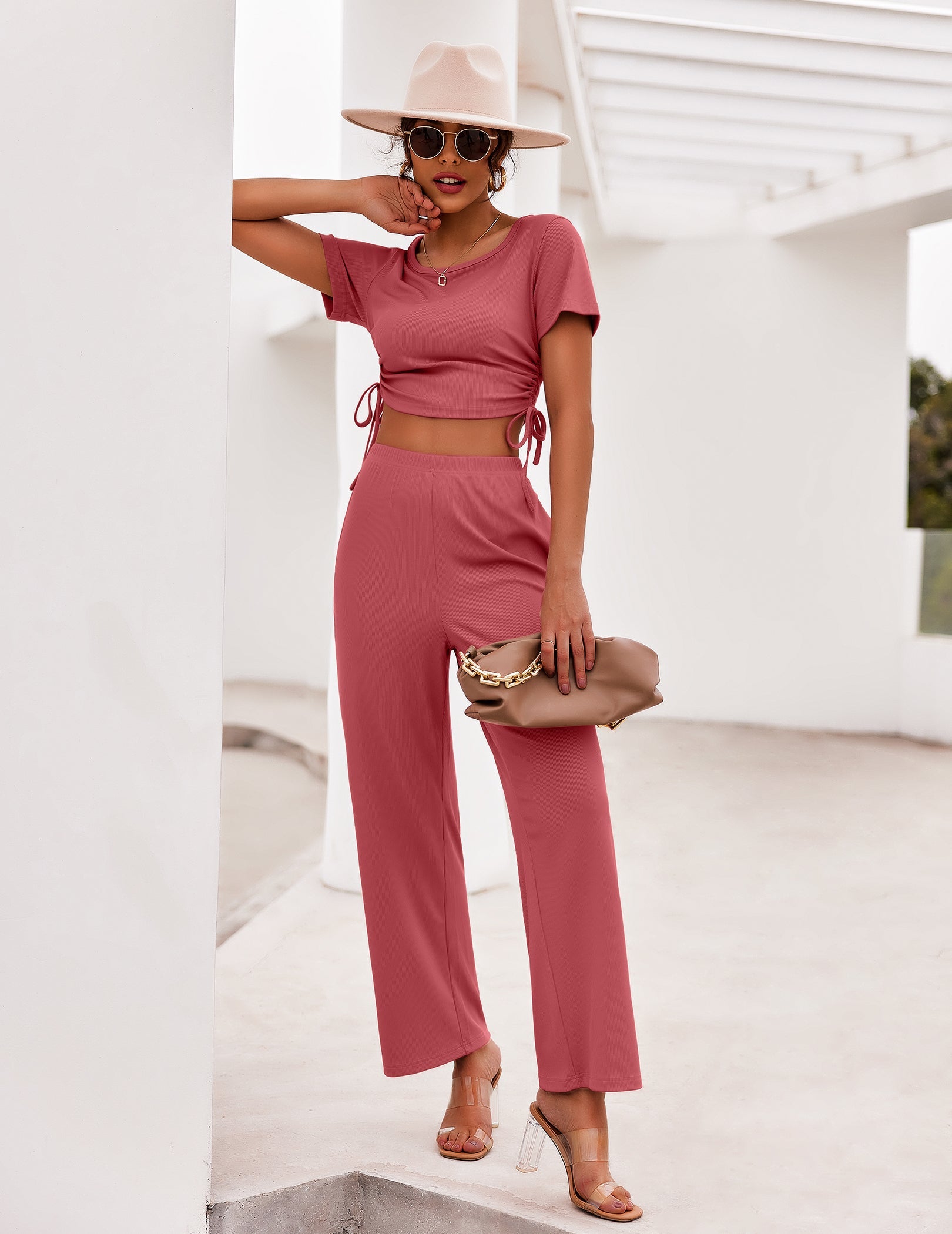 Two-piece lounge set in dusty rose: short-sleeve cropped top and relaxed wide-leg pants