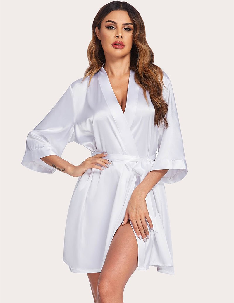 White satin night robe with V-neck and waist tie belt, side stance with hand on hip