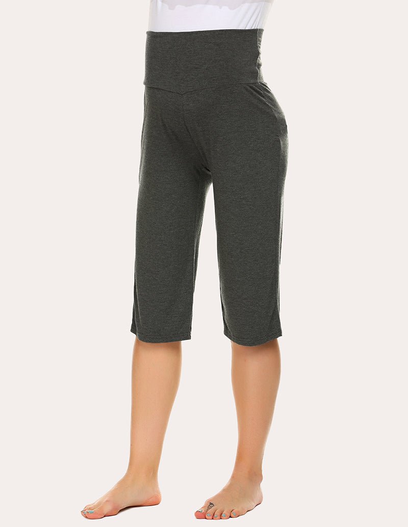 Maternity capri pants in dark green, mid-calf length with elastic waistband