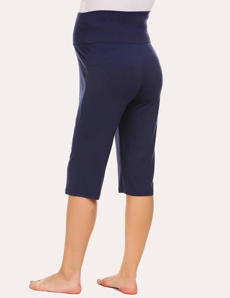 Maternity capri pants in navy with side view, mid-calf elastic waist