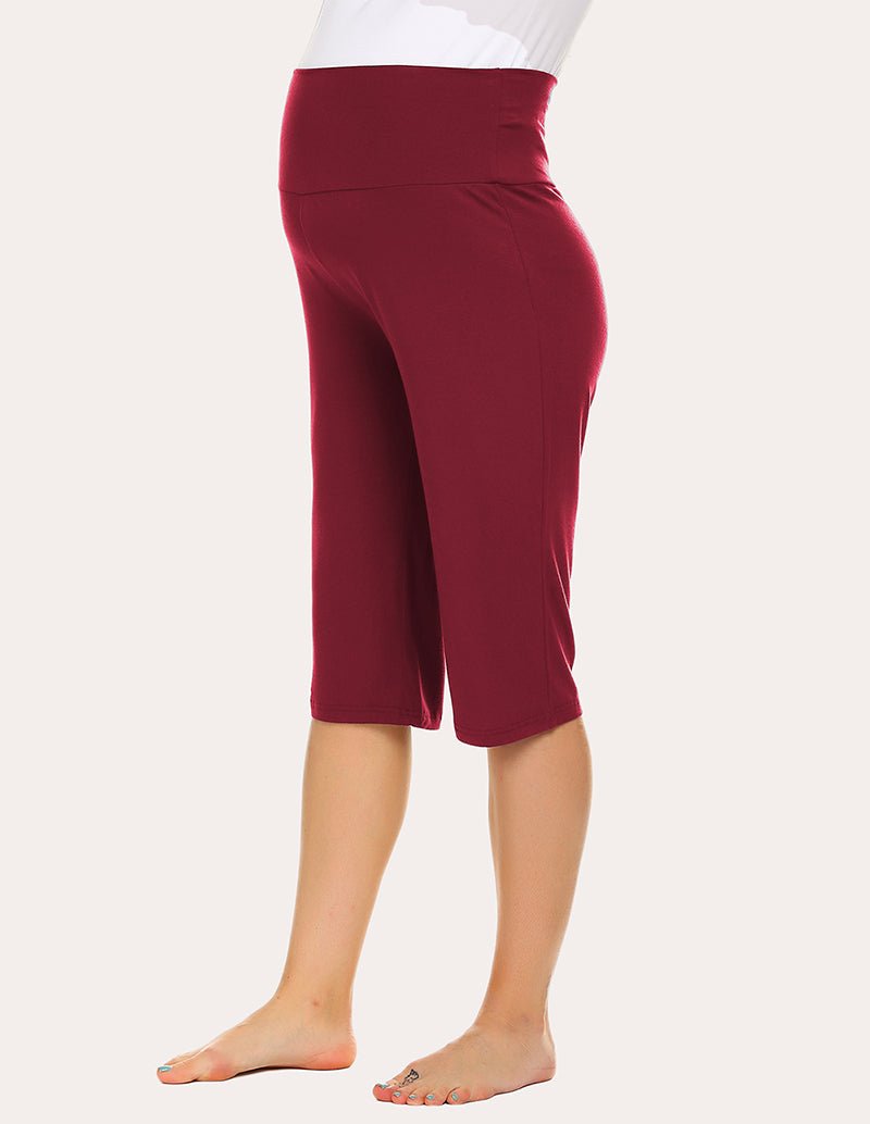 Wine red maternity capri pants, side view with tapered capri legs and elastic waist