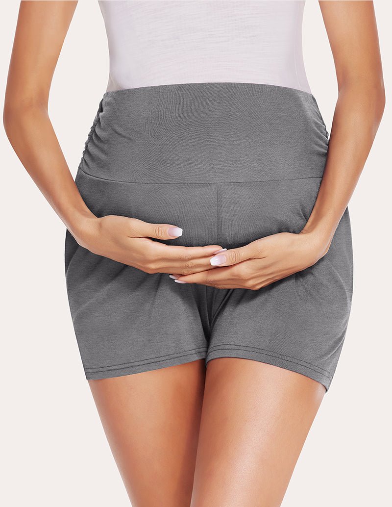 Dark grey maternity shorts, back view with gathered tummy panel
