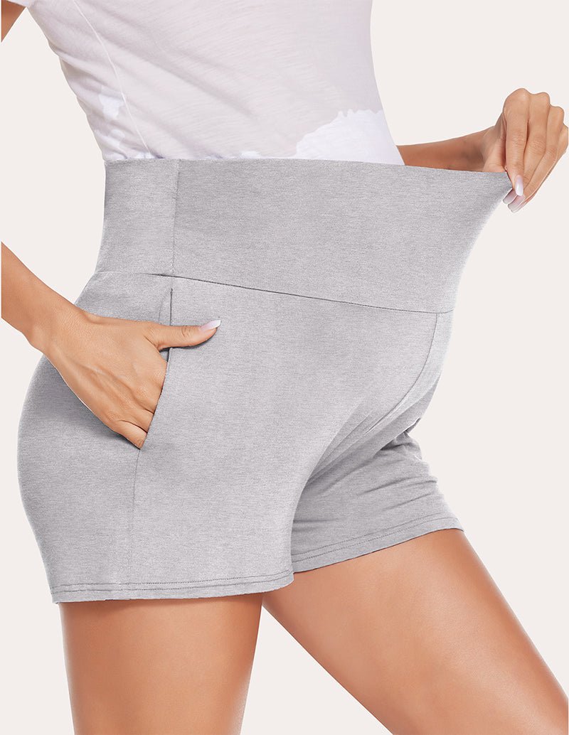 Light grey maternity shorts, angled side view with crossover tummy panel