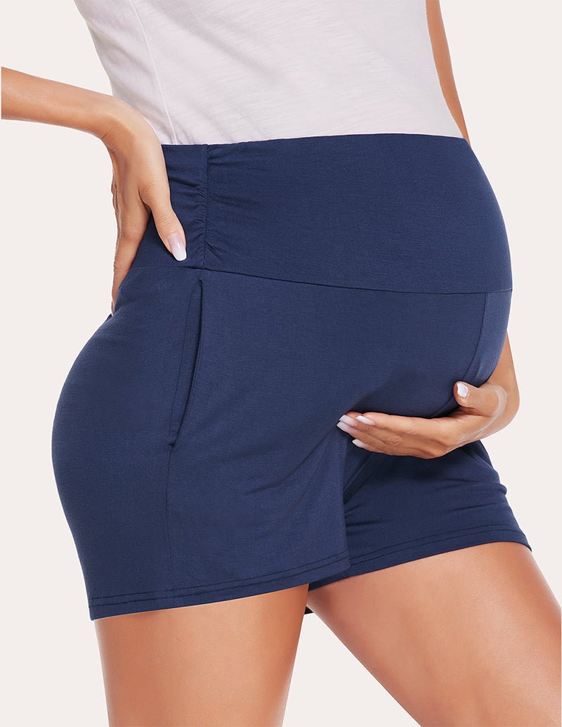 Navy maternity shorts with side ruching and front panel seam detail