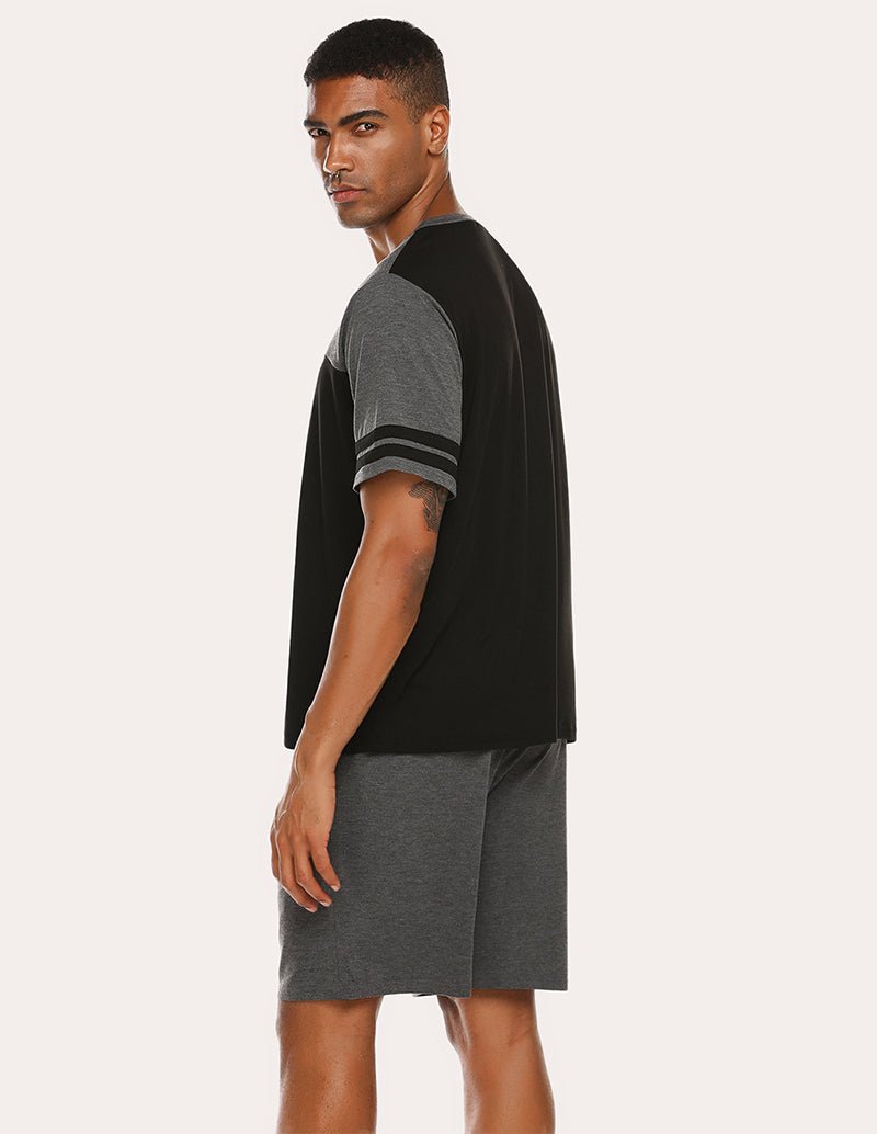 Men's contrast pajama set, side view with black body and gray shorts