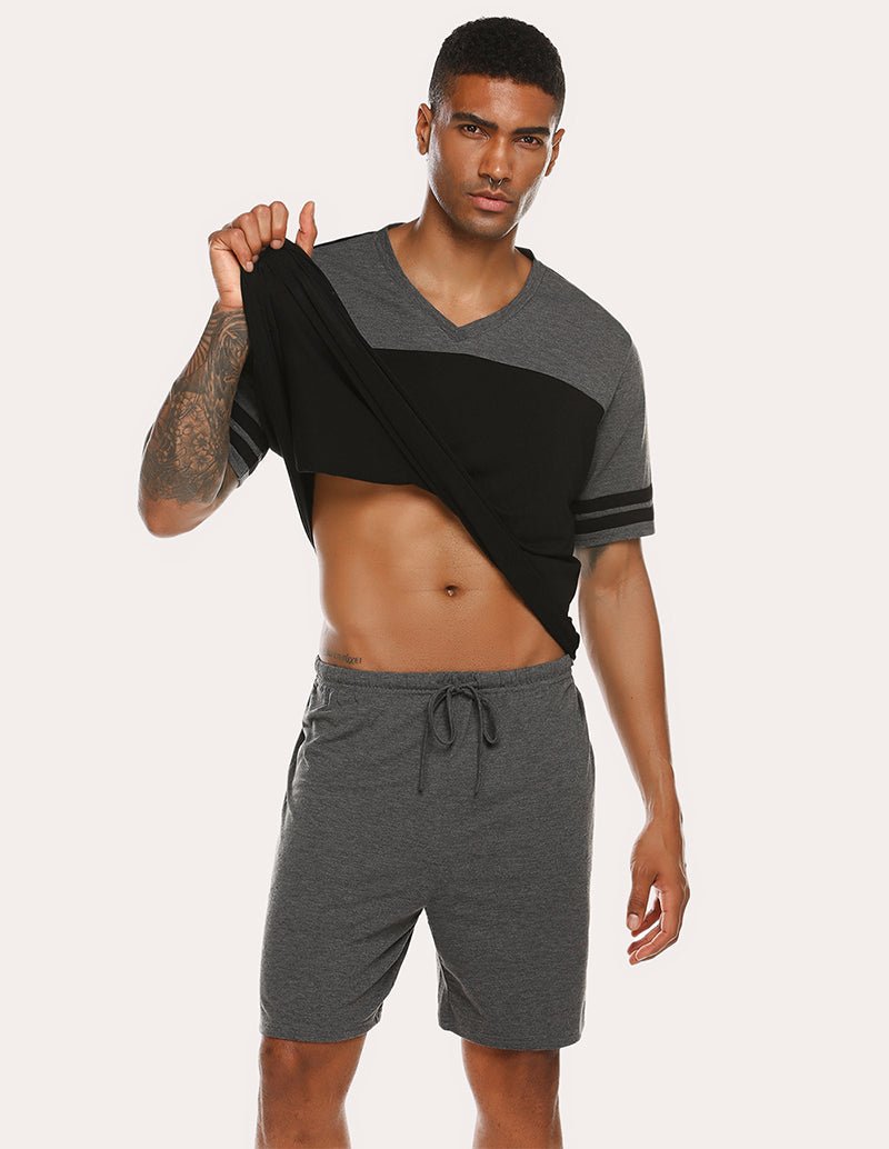 Men's contrast pajama set with navy shirt, black shorts, and drawstring waist
