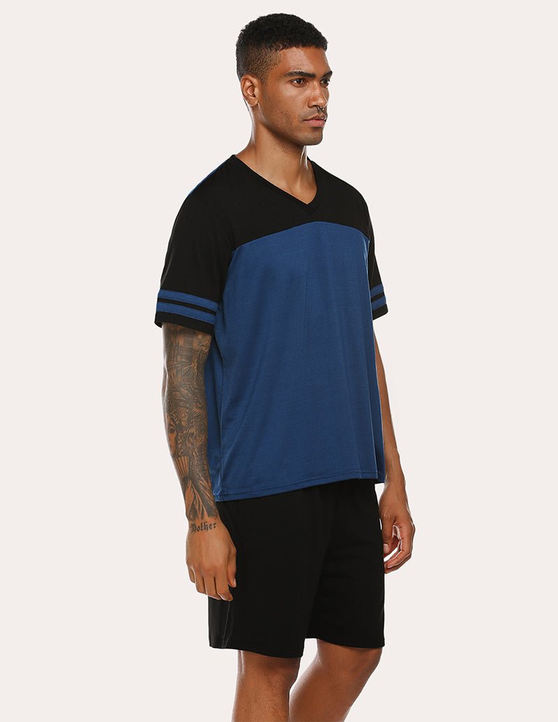 Men's contrast pajama set, side view with navy tee and black shorts