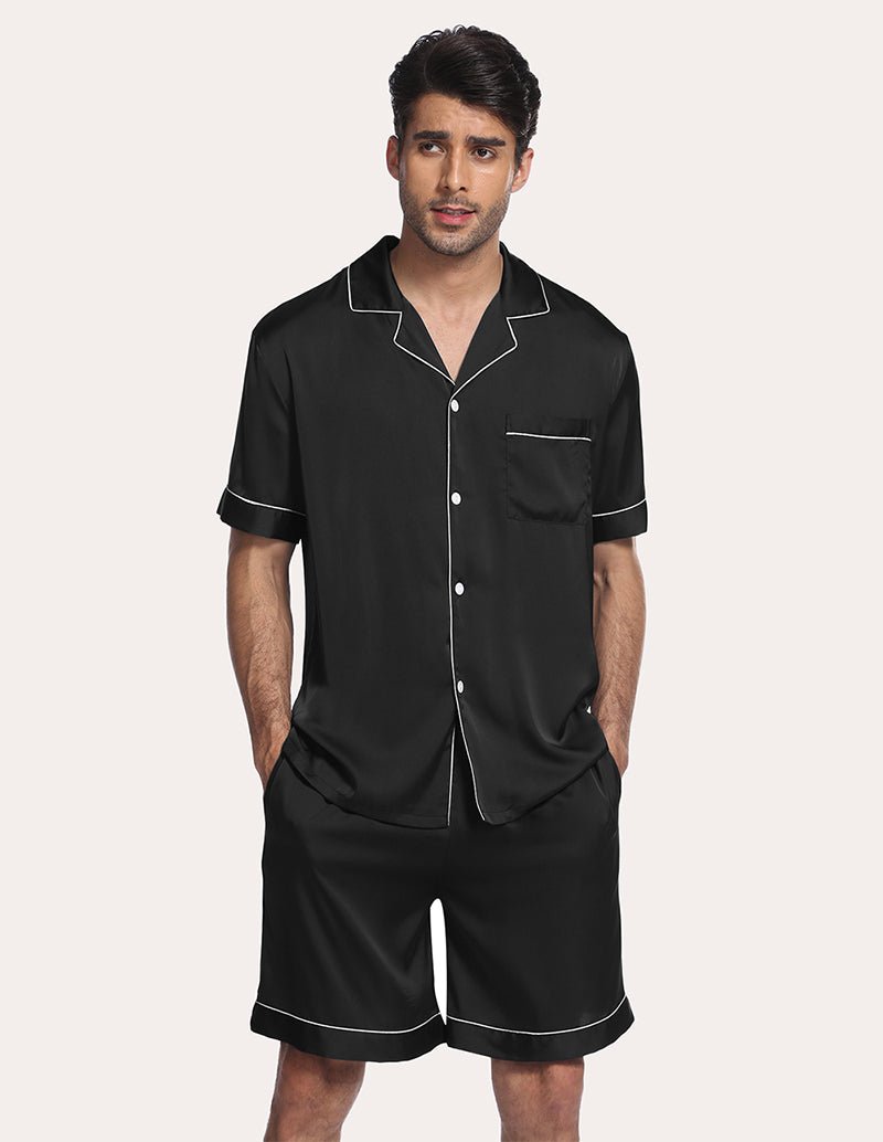 Men’s satin pajama set in black, button-up shirt and matching shorts with contrast piping