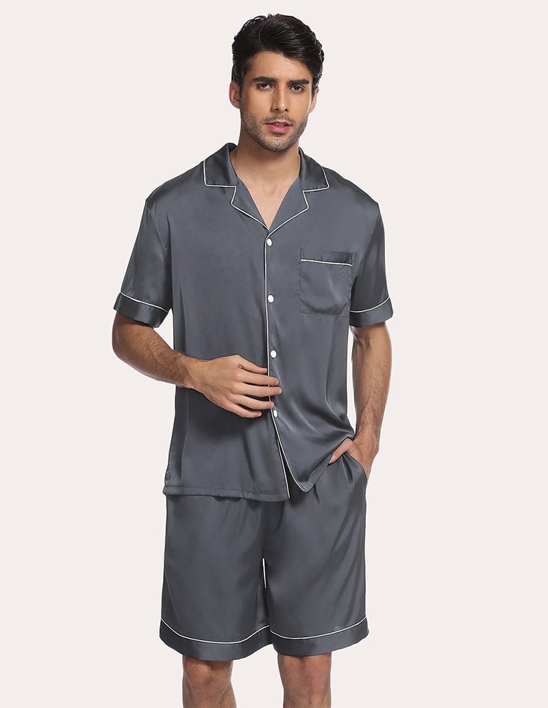Men’s dark blue satin pajama set, front view of button-up shirt and matching knee-length shorts