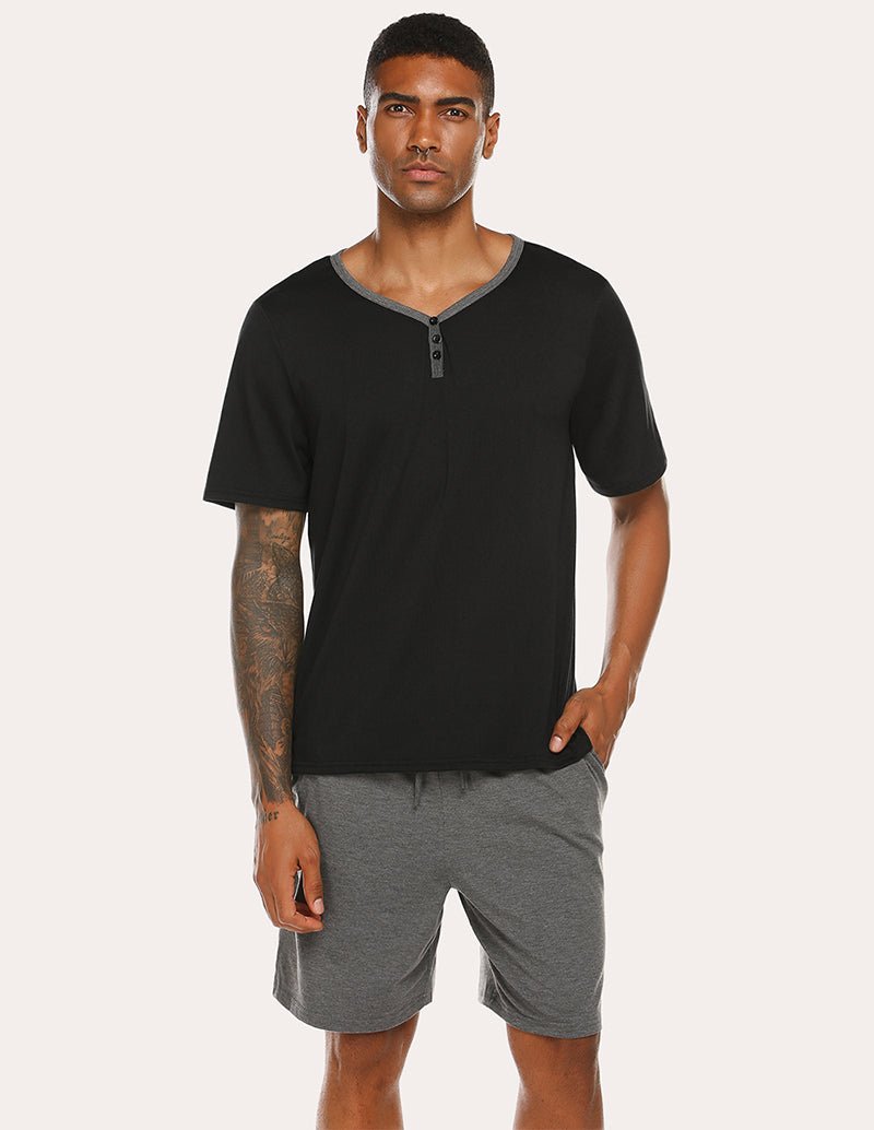 Men's black short-sleeve pajama top with gray drawstring shorts set