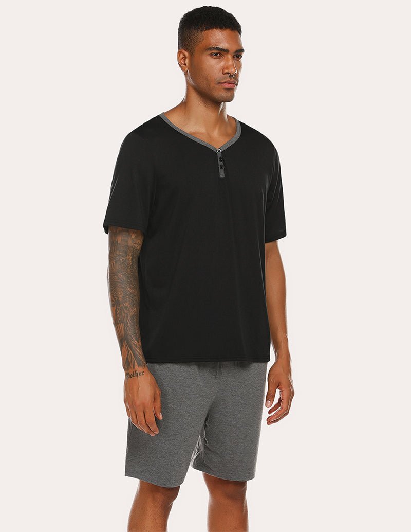 Men's black short-sleeve pajama top with gray drawstring shorts set