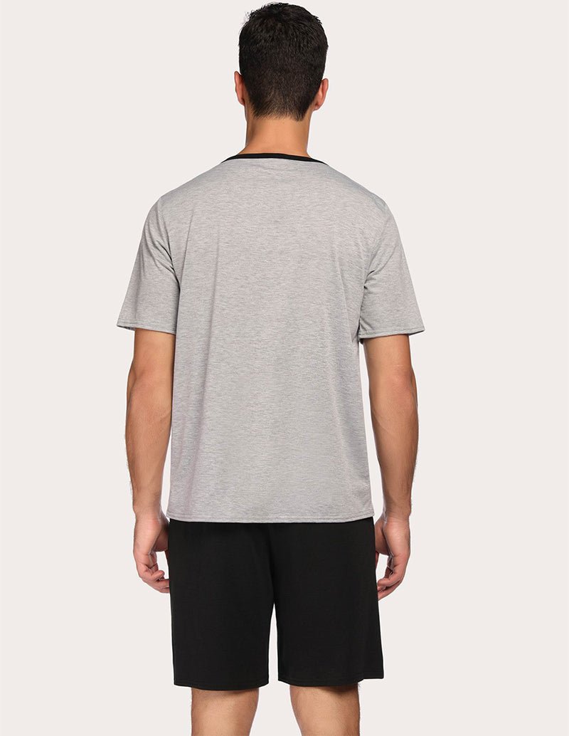 Men's gray short-sleeve pajama top and black drawstring shorts, back view